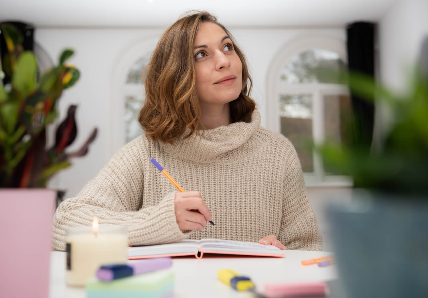 woman thinking about what to write
