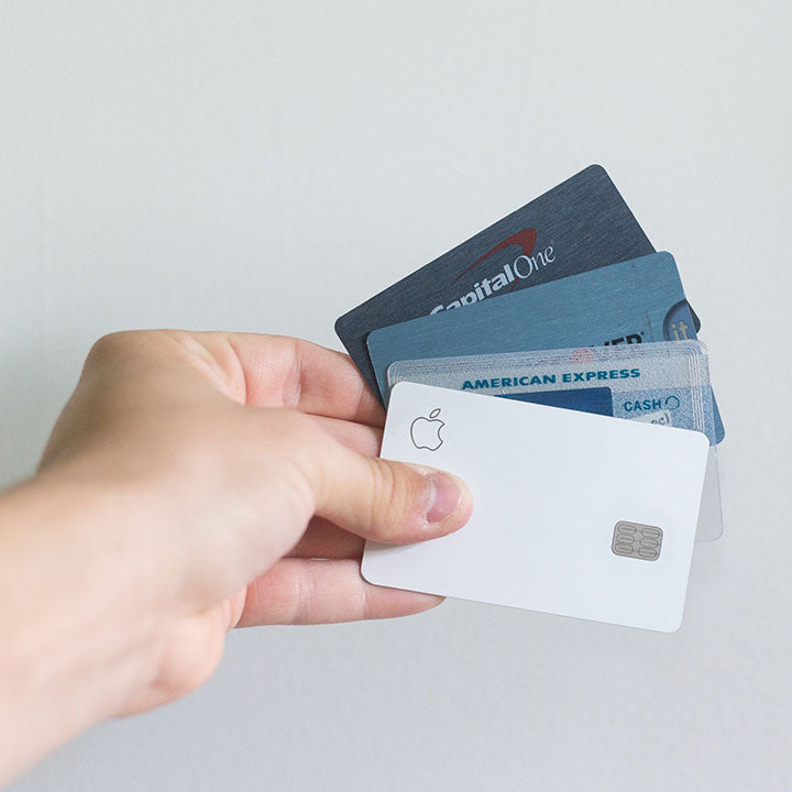 hand holding cards like credit cards or debit cards