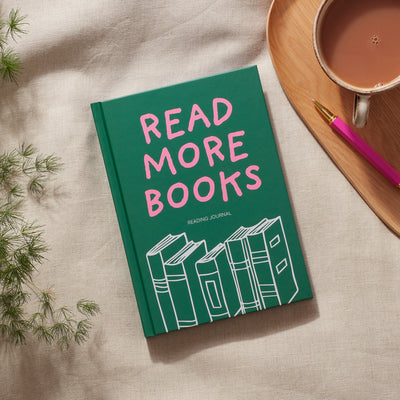 Reading Journal featuring 'Read More Books' with colorful typography and stacked books design.