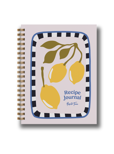 Lemon recipe journal with vibrant lemon design, spiral binding and playful typography for culinary creativity.