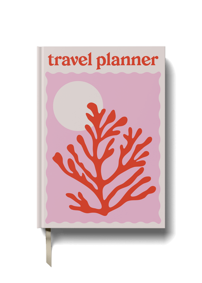 A5 travel planner with a pink background and a red coral illustration on the cover, titled 'TRAVEL PLANNER' at the top.