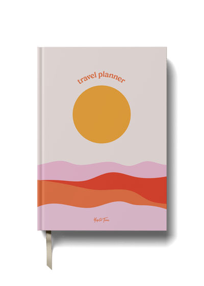 Travel planner with a sunset-inspired design featuring warm colors and cheerful typography for adventure lovers.