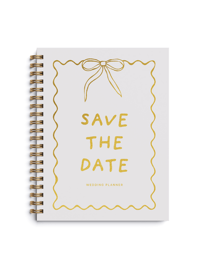 Wedding planner book with gold foiling and Save the Date design on a spiral cover.