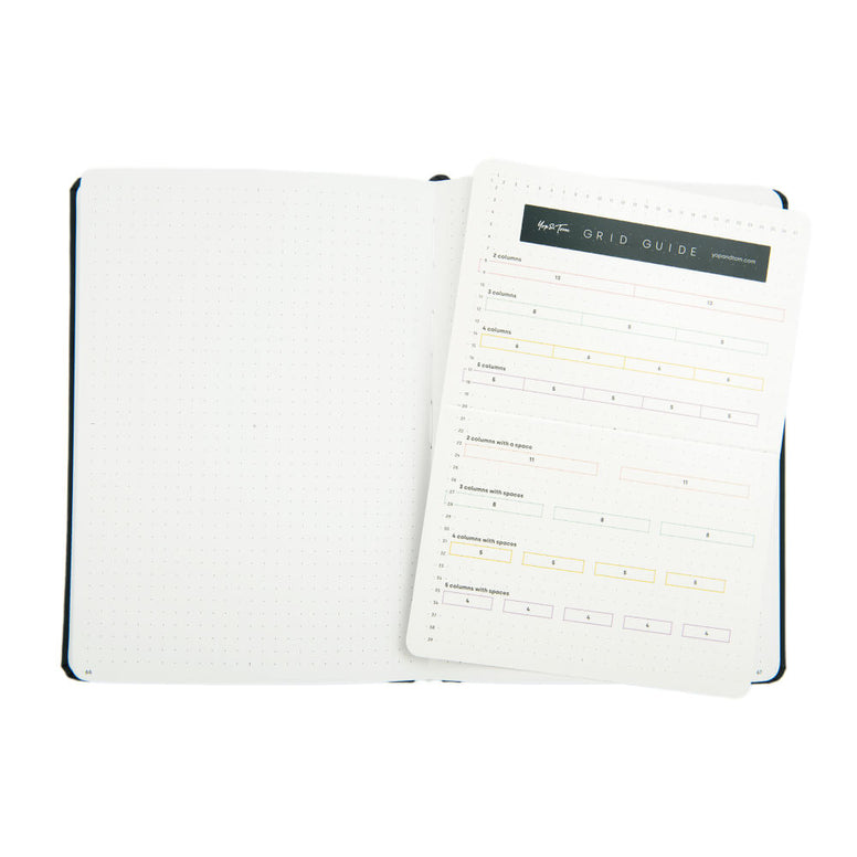 Open journal showing grid guide insert